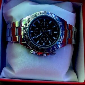 Never been worn silver watch in great condition.